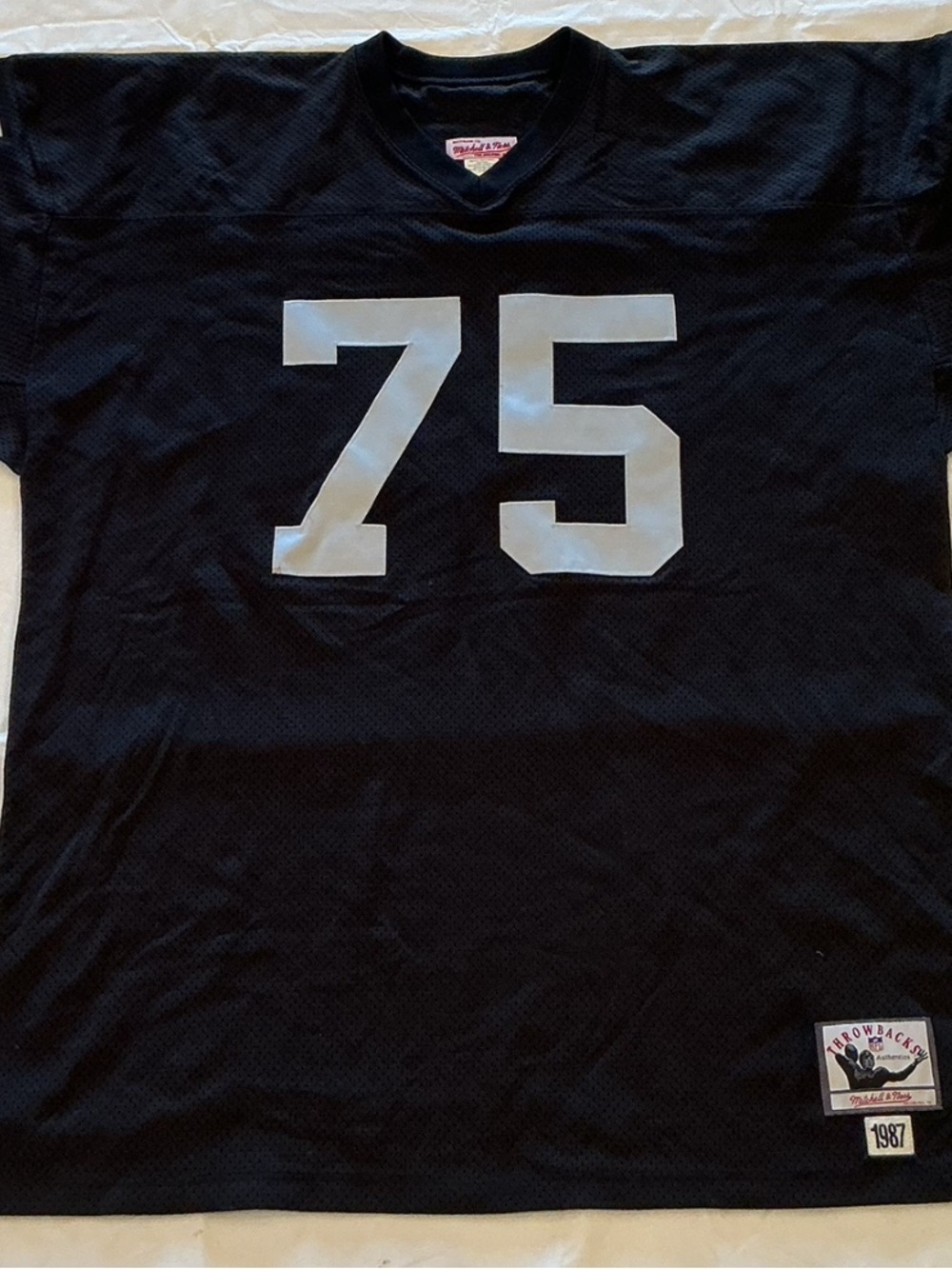 Howie Long #75 LA Raiders NFL Throwback Jersey.